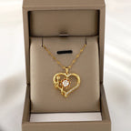 Naszyjnik z zawieszką z obracającym się sercem i kwiatem, przeciwstresowy