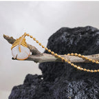 Naszyjnik z zawieszką piórka z cyrkonią