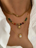 Naszyjniki z zawieszką słońca i perłami a