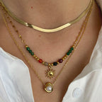 Naszyjniki z zawieszką słońca i perłami a