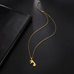 Naszyjniki dla par z zawieszką w kształcie nuty muzycznej w kolorze złotym