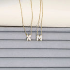 Damski naszyjnik choker z minimalistyczną zawieszką z inicjałem
