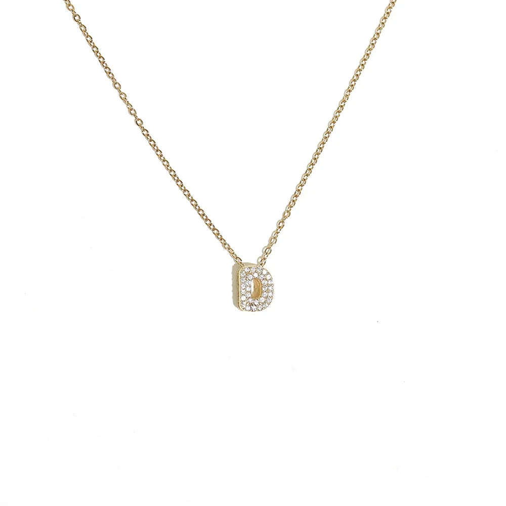 Damski naszyjnik choker z minimalistyczną zawieszką z inicjałem d