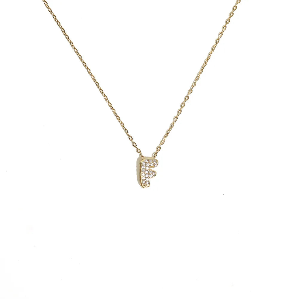 Damski naszyjnik choker z minimalistyczną zawieszką z inicjałem f