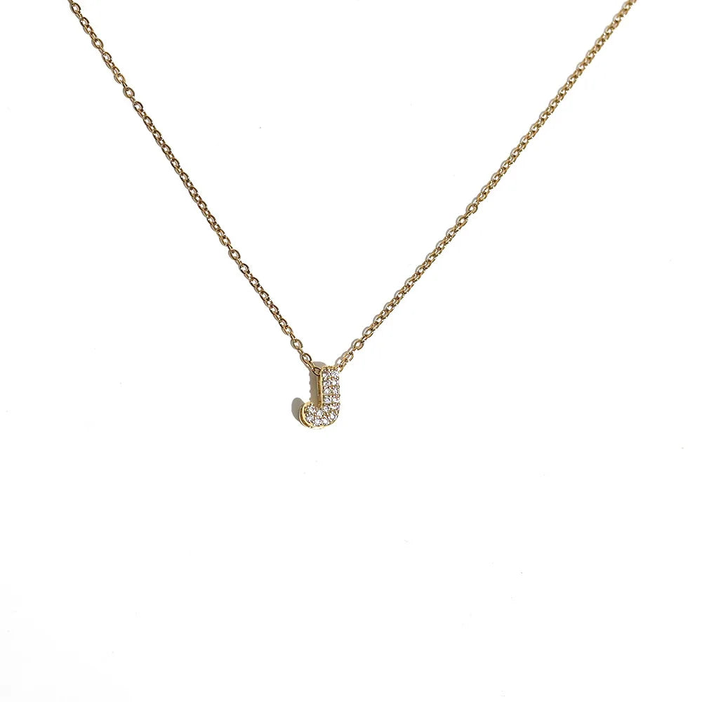 Damski naszyjnik choker z minimalistyczną zawieszką z inicjałem j