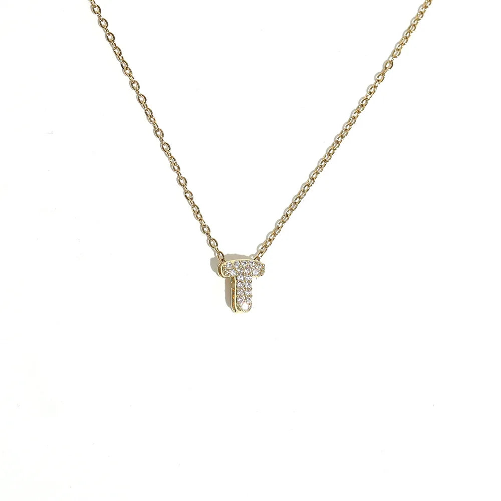 Damski naszyjnik choker z minimalistyczną zawieszką z inicjałem t