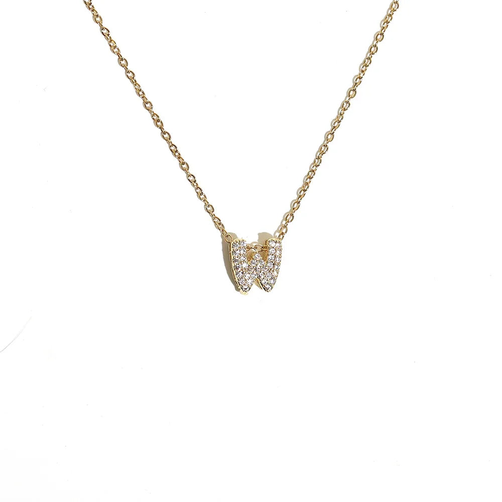 Damski naszyjnik choker z minimalistyczną zawieszką z inicjałem w