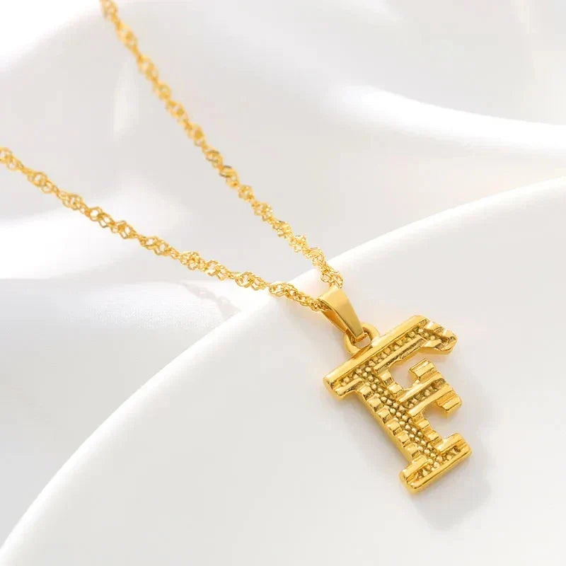 Naszyjnik damski lub męski z personalizowaną zawieszką z inicjałem F