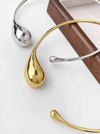 Naszyjnik obroża z zawieszką w kształcie kropli wody złoty