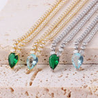 Uroczy naszyjnik obroża z wisiorkiem w kształcie kropli wody i cyrkonią złoty i niebieski