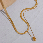 Naszyjnik obroża z dużą kroplą wody w kolorze złotym