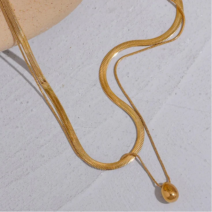 Naszyjnik obroża z dużą kroplą wody w kolorze złotym