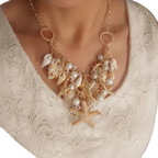 Duży naszyjnik z zawieszką z muszli, rozgwiazdy, muszelek i pereł 