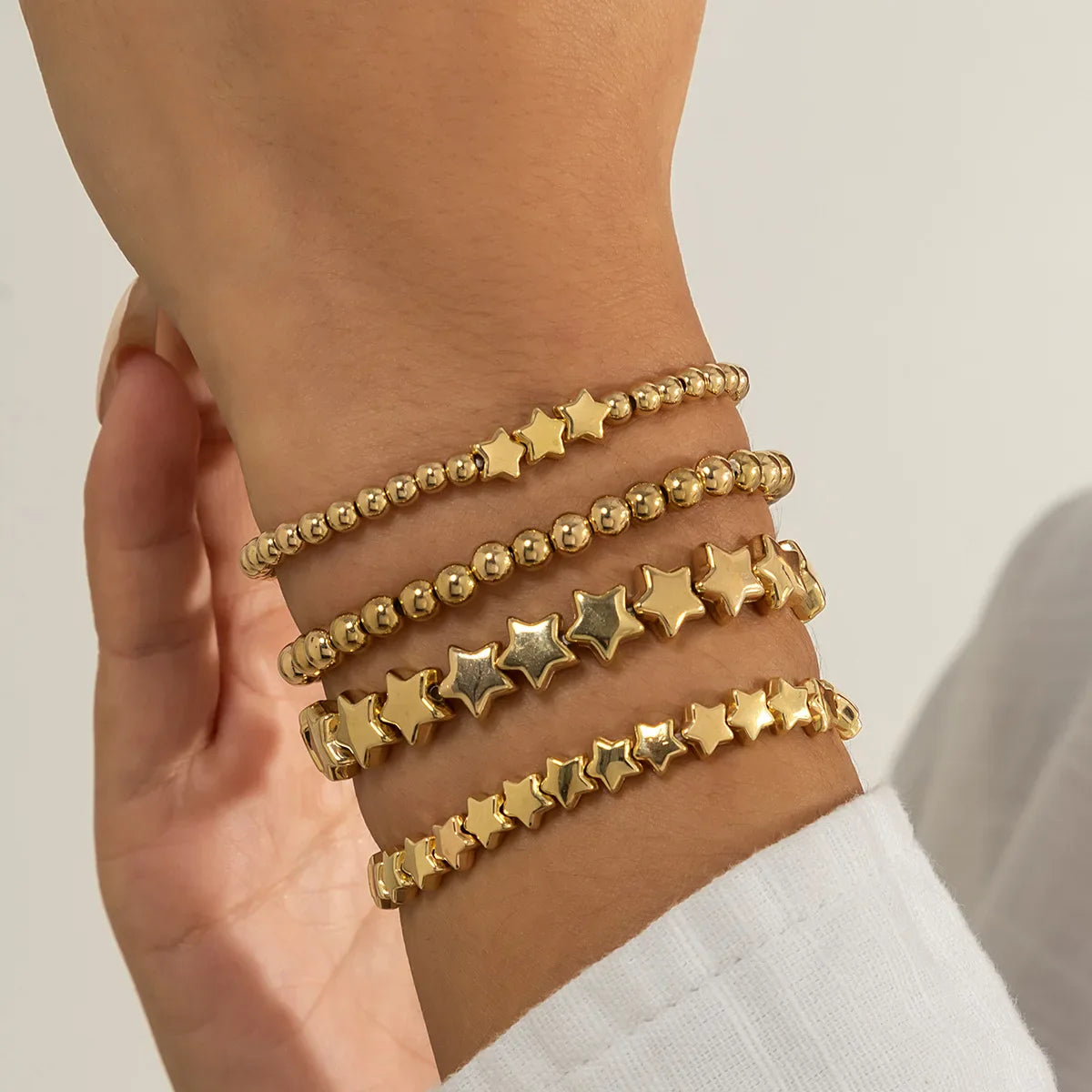 Lot de 4 Bracelets Etoiles or